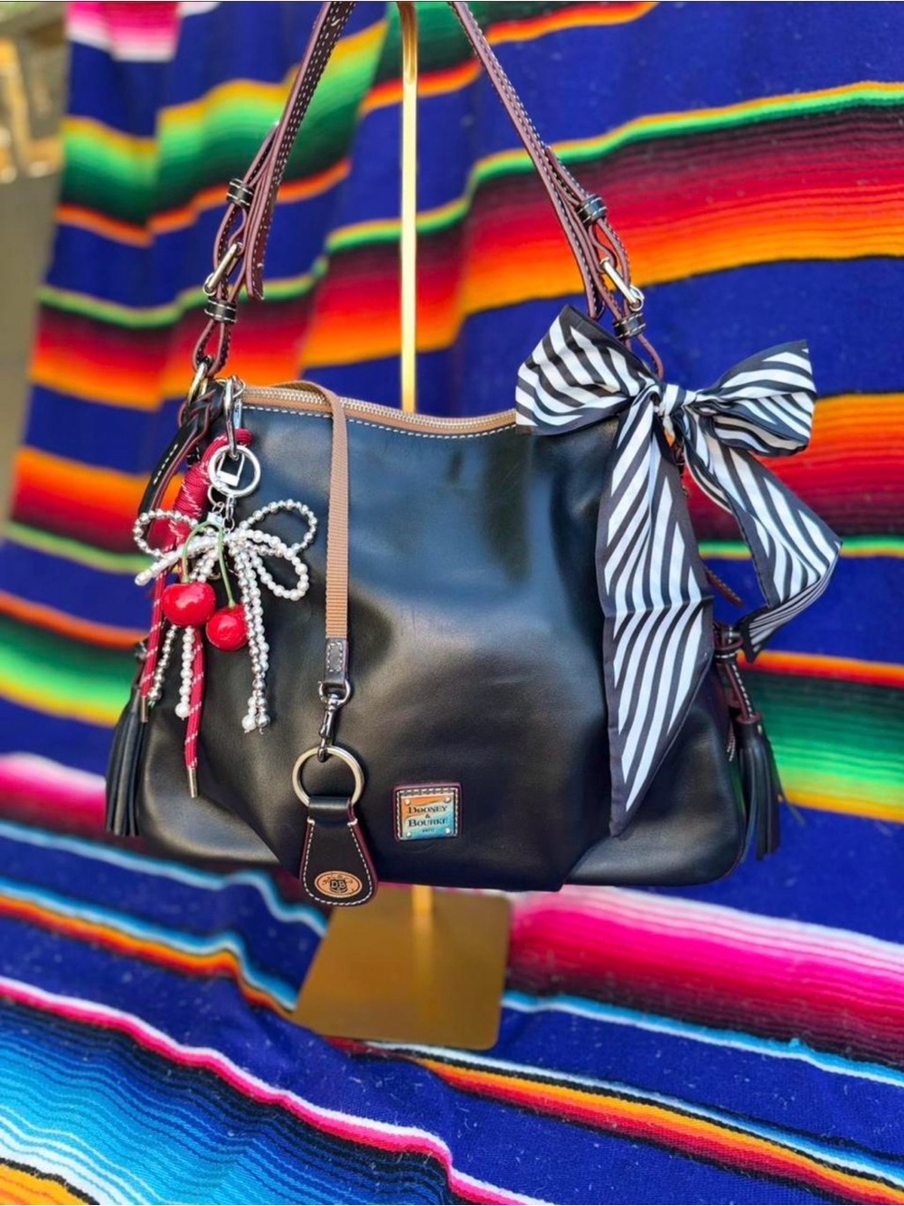 Dooney & Bourke Black Leather Shoulder Bag with Striped Bow
